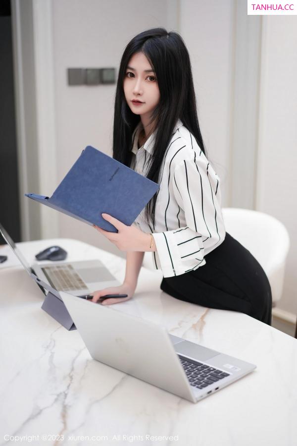 laura阿姣  [XiuRen]高清写真图 2023.06.02 No.6845 laura阿姣 短裙美腿第2张图片
